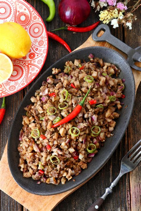 Authentic Kapampangan Sisig recipe using pork belly - Foxy Folksy