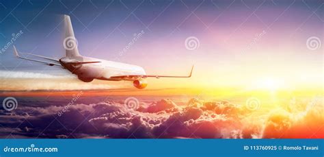 Airplane Flying Above Clouds Stock Image - Image of commercial, tourism: 113760925