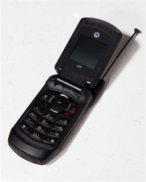 TE050 Motorola Black Flip Cell Phone Prop Rental | ACME Brooklyn