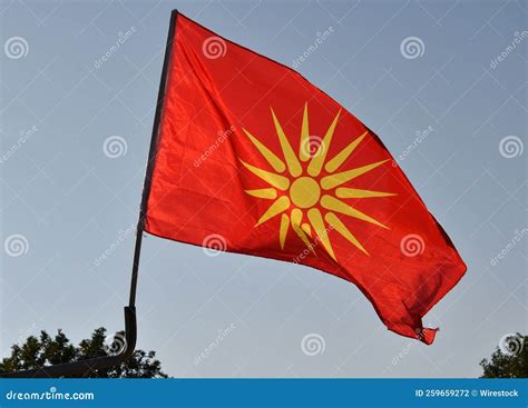 View of the Macedonian Flag on a Blue Sky Background Stock Photo - Image of sunny, view: 259659272