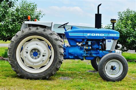 Blue Ford Tractor Photograph by Adam Riggs