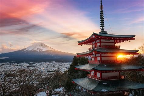 Sunset at the famous five storied Chureito Pagoda on the mountainside overlooking Mount Fuji. S ...