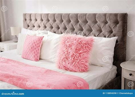 Fluffy Pillows on Bed in Room Stock Photo - Image of decoration, apartment: 118894598