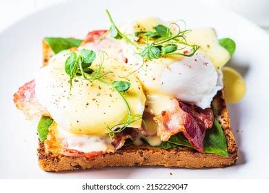 Eggs Benedict On Crispy Toast Bacon Stock Photo 2152229047 | Shutterstock