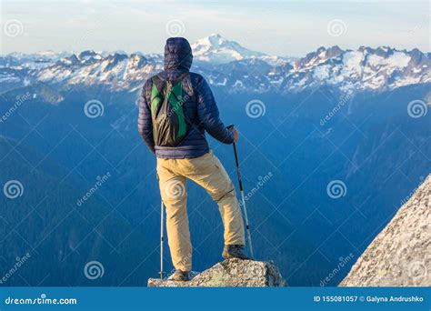 Man on the cliff stock image. Image of climb, hill, hiking - 155081057