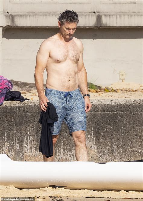 Eric Bana shows off his muscular form during a swim at Sydney's Balmoral Beach | Daily Mail Online