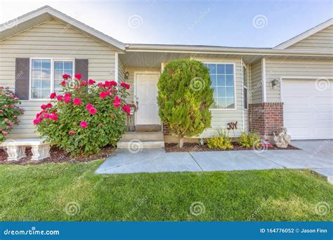 Exterior of One Storey Single Family Home with a Beautiful Front Garden ...