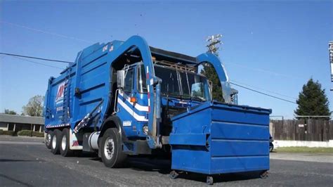 Garbage truck front loader - YouTube