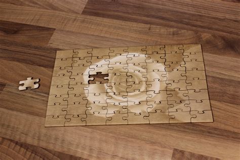 Laser Cut Wooden Jigsaw Puzzle With Engraving SVG File Free Download - 3axis.co