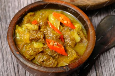 Premium Photo | Gulai kambing. gulai is made from coconut milk, mutton, beef, or chicken, chili ...