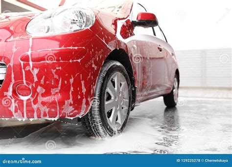 Red Auto with Foam at Car Wash. Stock Photo - Image of station, hygiene: 129225278