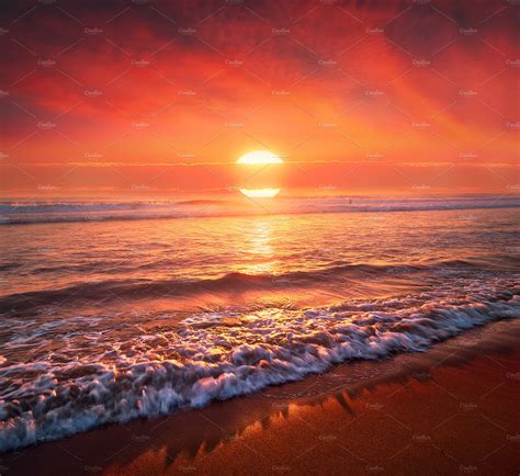 beautiful red sunset on beach | Nature Stock Photos ~ Creative Market