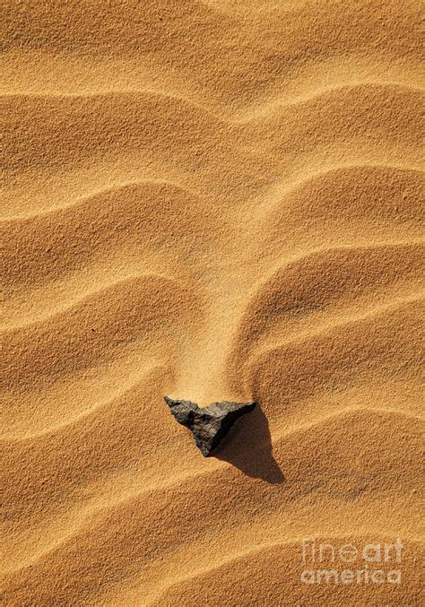 Rock in the sand of the Sahara Desert Photograph by Robert Preston - Fine Art America