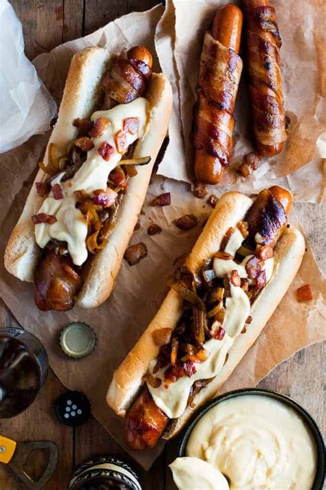 Bacon Wrapped Hot Dogs With Cheese Sauce | simplyrecipes