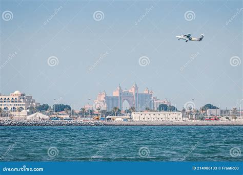 SkyDive Airplane Takes Off from the Airport from the Palm Jumeirah Island Against the Backdrop ...