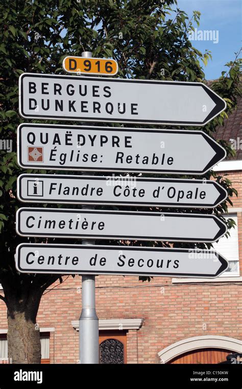 Typical French road signs on the D916 in the centre of the pretty Stock Photo: 35145709 - Alamy