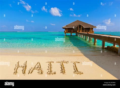 Word Haiti on beach Stock Photo - Alamy