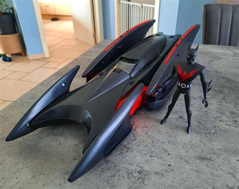 I recently picked up the old Hasbro Batman Beyond Batmobile for a steal! The Batmobile was ...