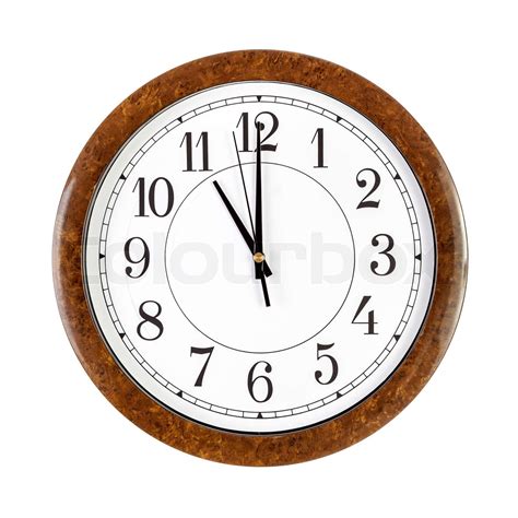 Clock face showing eleven o'clock | Stock image | Colourbox