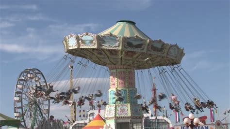 Carnival And Thrill Rides Fast Motion Time Lapse. Families And Kids ...