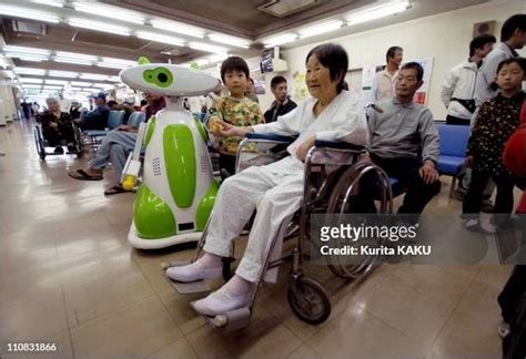 Japan Introduces First Hospital Robot Guide Photos and Premium High Res Pictures - Getty Images