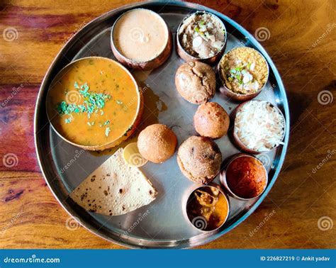 Rajasthani Thali Including Dal Bati and Churma Stock Image - Image of ...