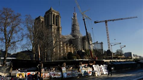 Notre-Dame’s Fire-Damaged Spire Rises Again - The New York Times