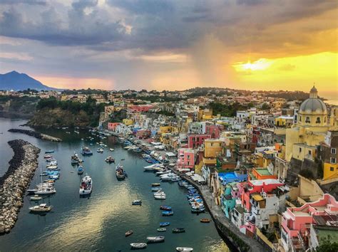 Marina Corricella at sunset, Procida island travel guide Almafi Coast Italy, Amalfi Coast ...