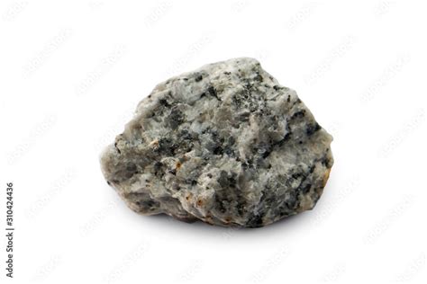 The granite pegmatite isolated on white background, A pegmatite is an igneous rock. There is ...