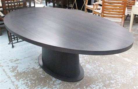 DINING TABLE, oval, black ash top on pedestal support, 210cm x 125cm x ...