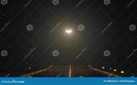 Airplane takeoff at night stock footage. Video of headlight - 250833634