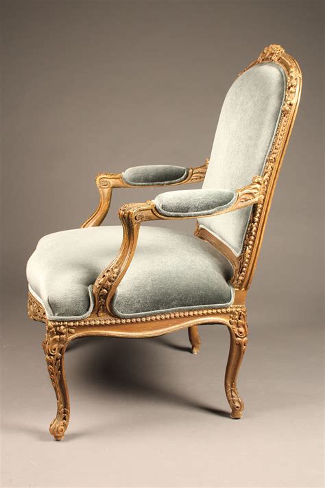 Antique pair of French Louis XV bergère chairs.