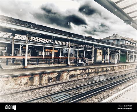 Guildford train station, platform and rail tracks Stock Photo - Alamy