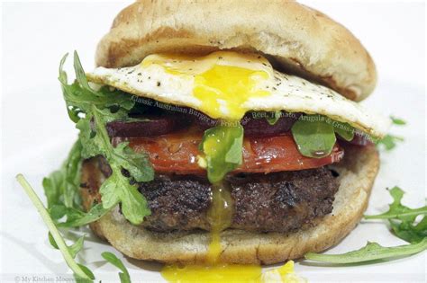 LOVED these in Australia. Classic australian burger with fried egg beet tomato arugula and grass ...