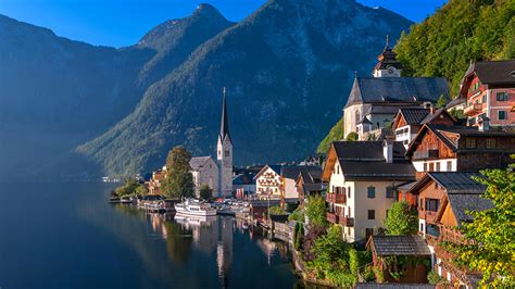 Papeis de parede 1366x768 Áustria Casa Lago Montanhas Atracadouros Hallstatt (Alta Áustria ...