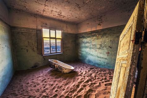 The Dark History of Kolmanskop - Namibia’s Abandoned Diamond Town