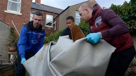 Carlisle United players help victims of severe flooding | ITV News