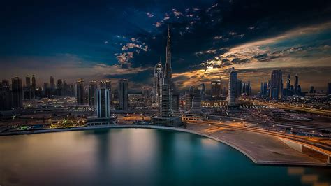 Download United Arab Emirates Dubai Skyline Sunset Wallpaper | Wallpapers.com