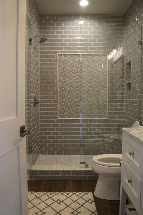 Gray subway tile shower with framed accent panel | Shower tile, Subway ...