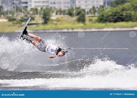 Water Ski In Action: Woman Shortboard Tricks Editorial Stock Image - Image: 7179624