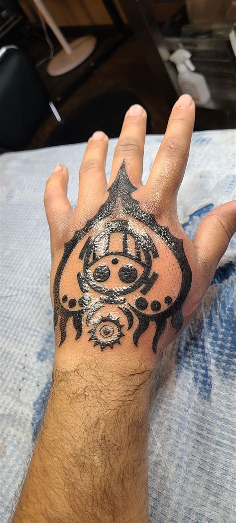 Trafalgar Law tattoo in 2023 | Law tattoo, One piece tattoos, Hand tattoos