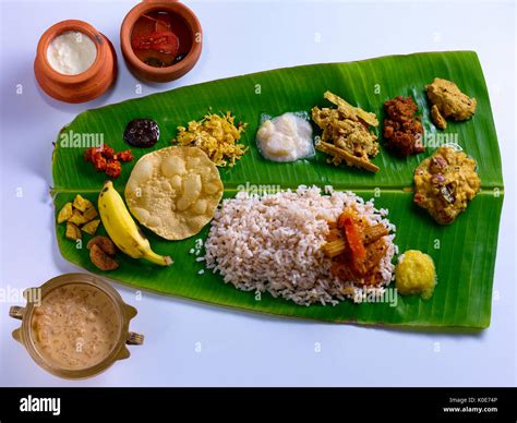 Onam Sadya in banana leaf served in Kerala Stock Photo: 155206262 - Alamy