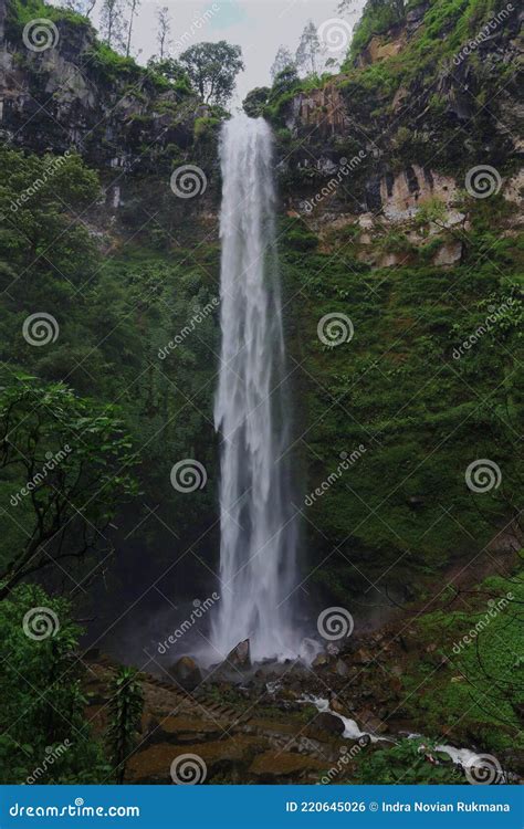 The Beautiful Coban Rondo Waterfall Stock Photo - Image of holidays, fountain: 220645026