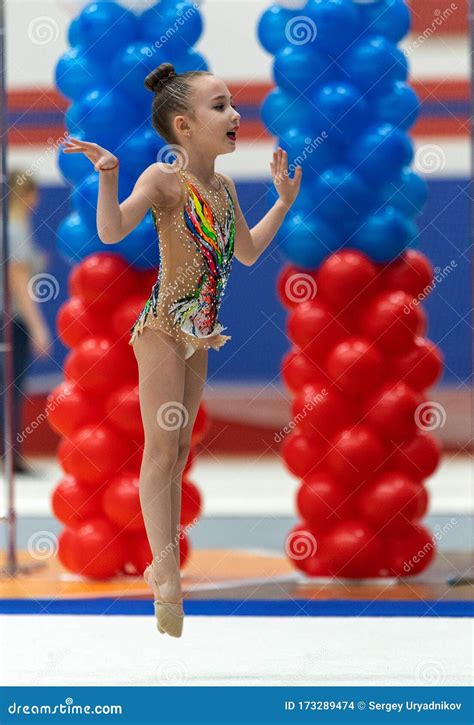 Adorable Sporty Little Girl In Rhythmic Gymnastics. Children`s Rhythmic Gymnastics Competition ...