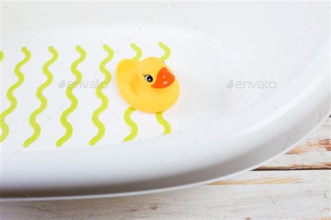 Rubber ducks in baby bath Stock Photo by FabrikaPhoto | PhotoDune