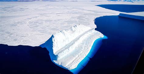 Melting Antarctic ice could slow global temperature rise, study says ...