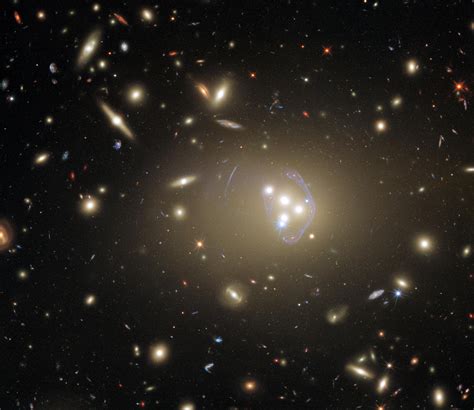 Our Giant Universe: Hubble Spots Massive Galaxy Cluster With a Wealth of Exciting Possibilities