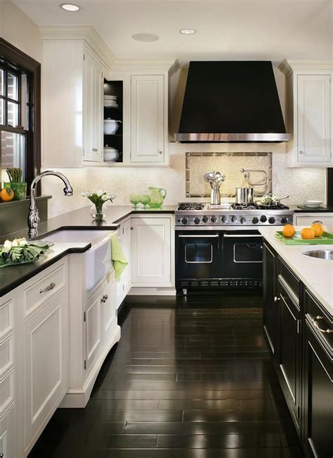 dark floor kitchen white cabinets - Enthroned Site Photo Gallery