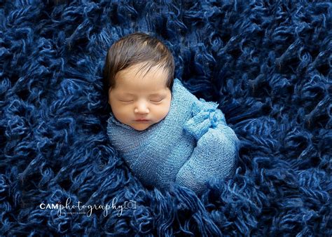 40 Newborn Photo Ideas for Boys & Girls at Home or Studio