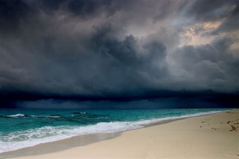 10. Watch a storm on the beach | Storm clouds, Clouds, Beautiful landscapes